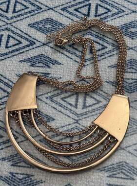 Gold Tone Statement Bib Necklace with Multi-Chain Detail